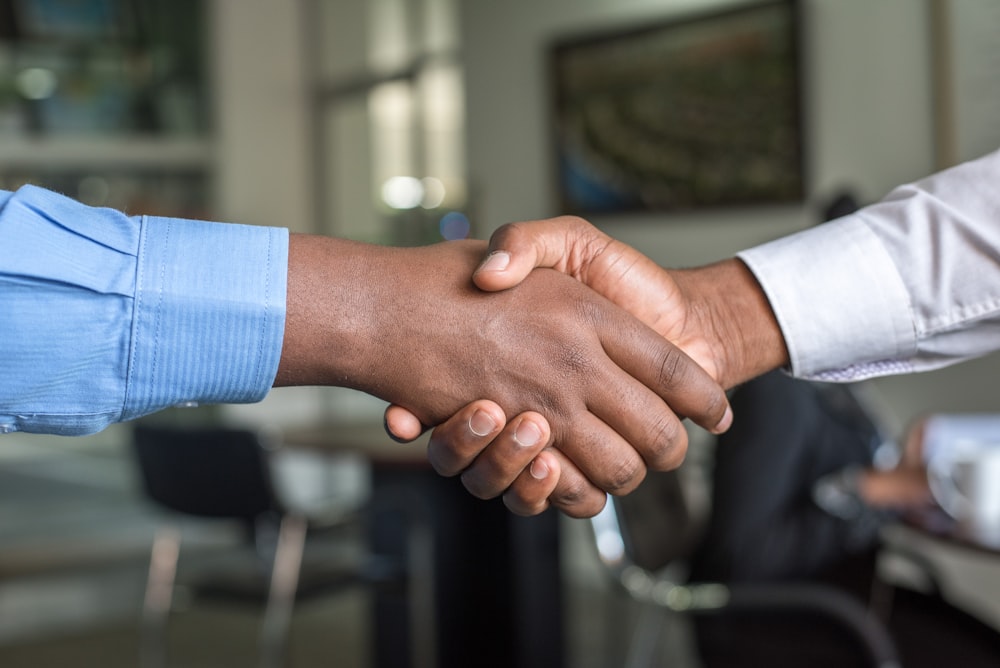Business partners shaking hands on a trade deal